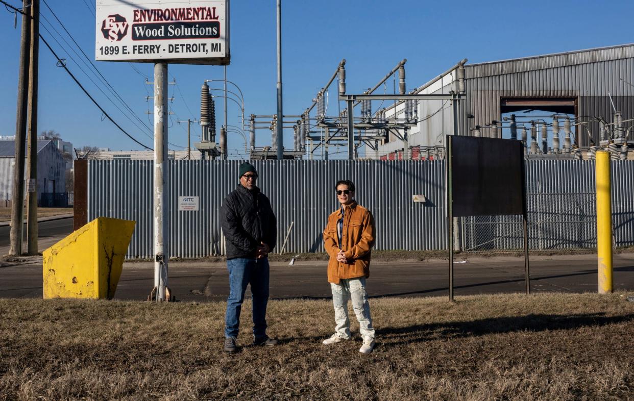 Darryl Morgan, left, 57, and Luis Quiroz-Gonzalez, 40, stand outside the Environmental Wood Solutions facility in Detroit on Tuesday, Feb. 20, 2024. Morgan worked at Environmental Wood Solutions for over a year as a heavy haul truck driver and Quiroz-Gonzalez worked as a heavy equipment operator. They both are plaintiffs in a case against the Lake Orion-based trucking company Environmental Wood Solutions.