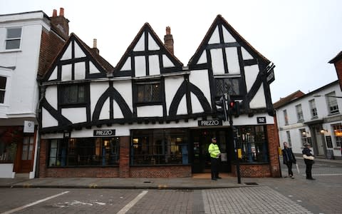 Prezzo on Monday with police standing guard - Credit: Jonathan Brady