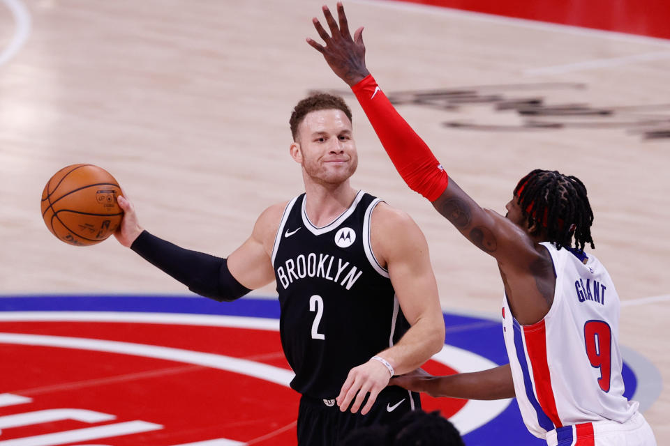Mar 26, 2021; Detroit, Michigan, USA; Brooklyn Nets forward Blake Griffin (2) is defended by Detroit Pistons forward Jerami Grant (9) in the second half at Little Caesars Arena.