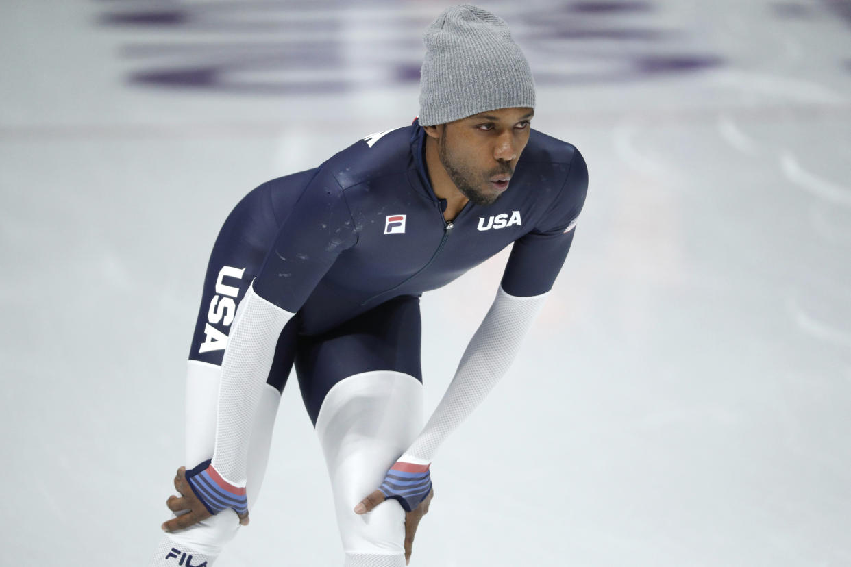 Shani Davis didn’t walk with the Americans during the Opening Ceremony. (AP)