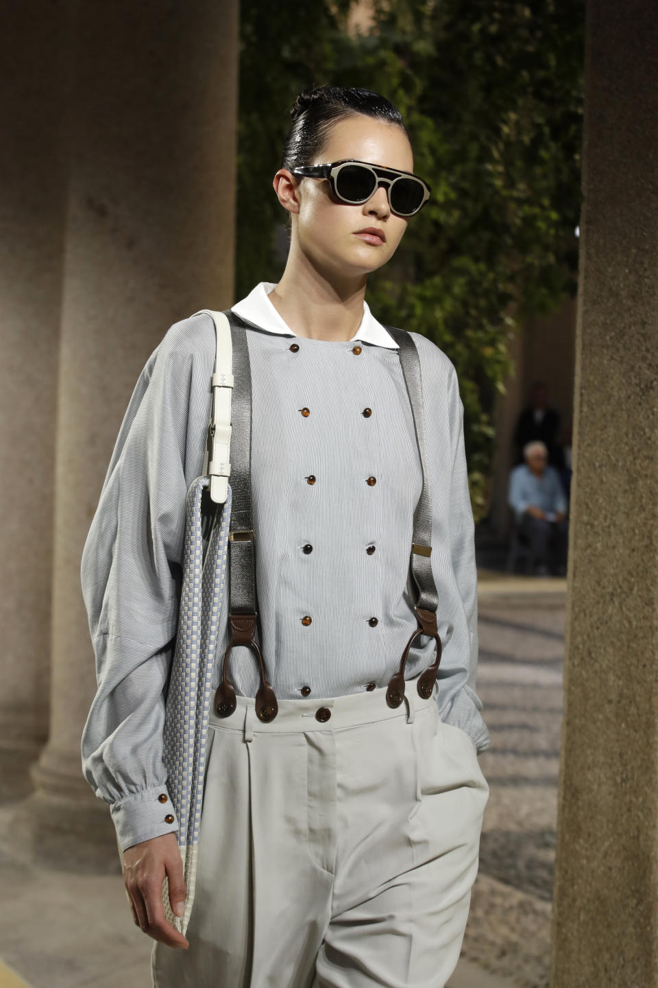 A model wears a creation as part of the Armani men's Spring-Summer 2020 collection, unveiled during the fashion week, in Milan, Italy, Monday, June 17, 2019. (AP Photo/Luca Bruno)