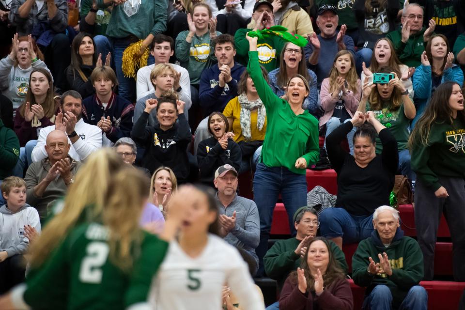 York Catholic fans celebrate a point during the PIAA Class 2A volleyball championship against Freeport in November. Parents should be there to cheer and be positive for their student-athletes, instead of being overbearing.