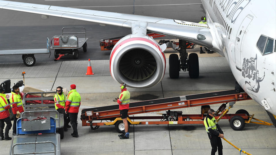 A cluster of coronavirus cases has been identified among baggage handlers at Adelaide Airport. Source: AAP