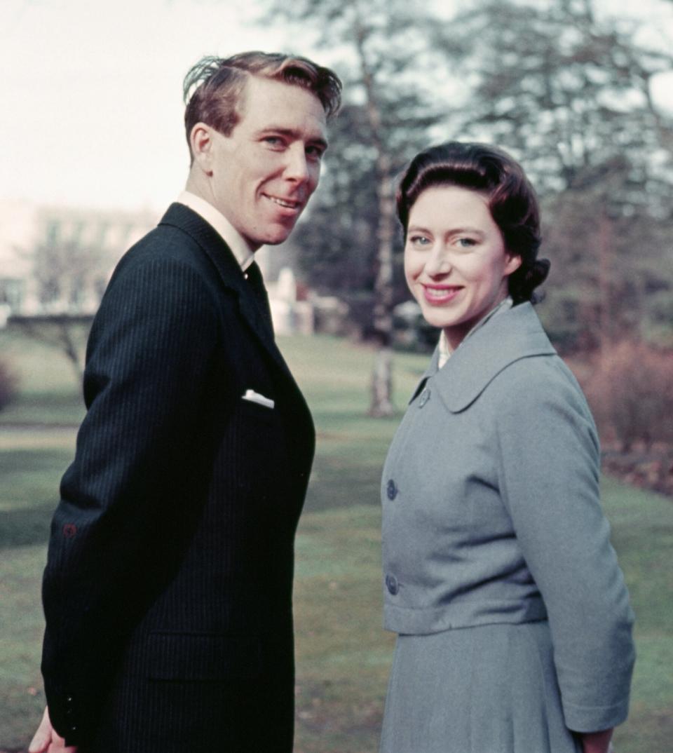 Princess Margaret Announces Engagement. Windsor, Berkshire, England: Princess Margaret and Anthony Armstrong-Jones leave Windsor lodge to stroll the grounds following the announcement of their engagement here.