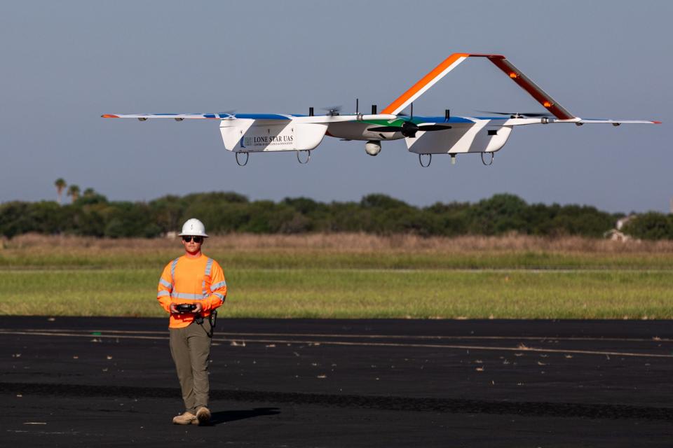 Loan Star UAS senior pilot Grady Booth launches the Commaris Seeker, a long range electric fixed-wing drone weighing less than 55-pounds, during a field test at Nueces County Airport on Friday, Sept. 29, 2023, in Robstown, Texas.
