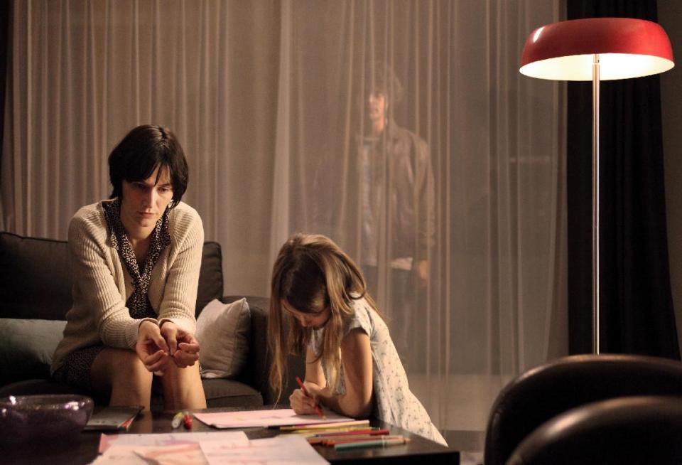 This image released by The Sundance Channel shows Clotilde Hesme, left, Brune Martin, center, and Pierre Perrier in a scene from "The Returned," premiering Oct. 31, at 9 p.m. EST. (AP Photo/The Sundance Channel, Jean Claude Lother)