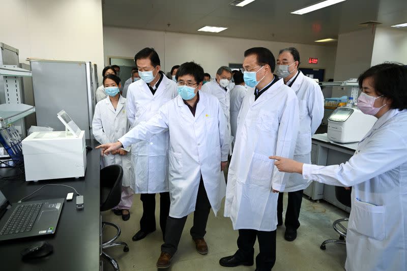 Chinese Premier Li Keqiang visits the Chinese Center for Disease Control and Prevention in Beijing