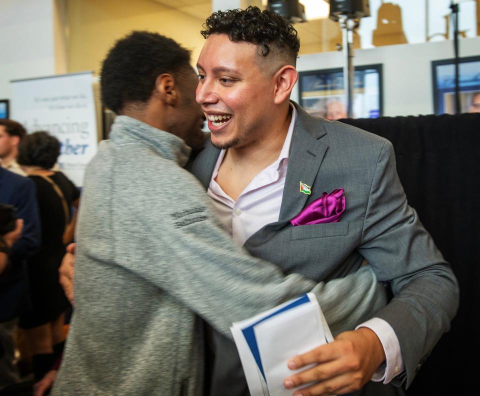 Medical student Christian Pineda, of Fitchburg, receives congratulations after learning that he'll be heading to the West Coast.