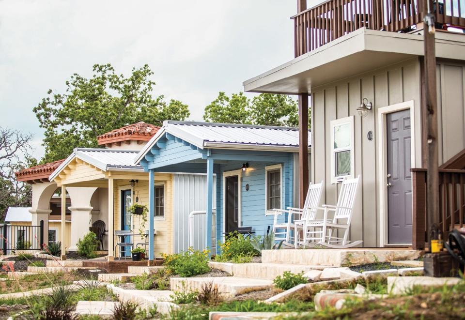 The project's tiny houses reflect vernacular architecture.