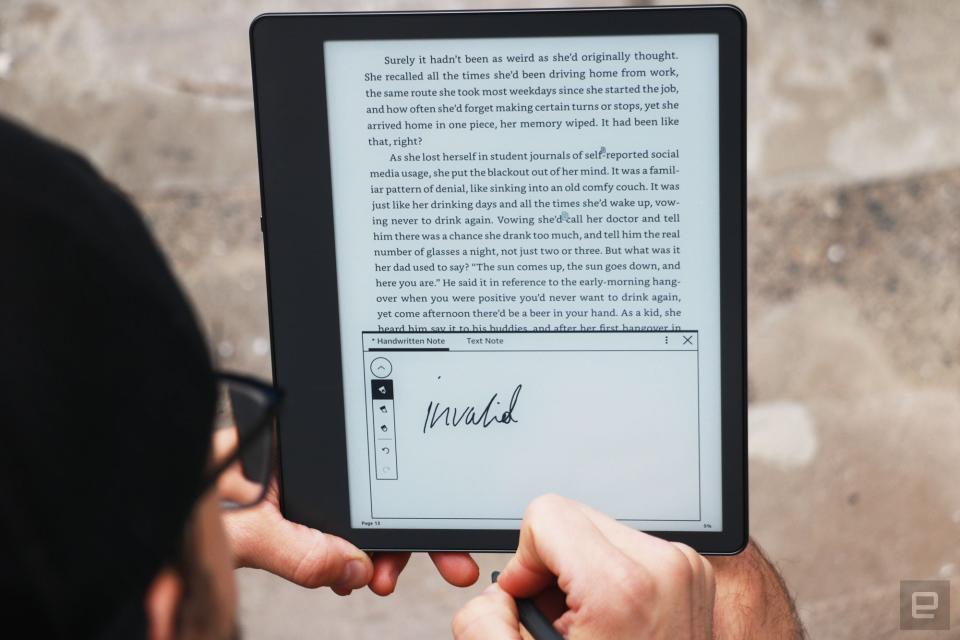 A sticky note box at the bottom of the Kindle Scribe's screen. The rest of the display shows paragraphs of text. Inside the rectangle, someone has written the word 