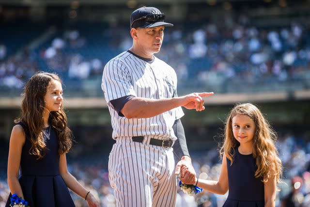 <p>Rob Tringali/SportsChrome/Getty</p> Alex Rodriguez with daughters Natasha and Ella in 2015.
