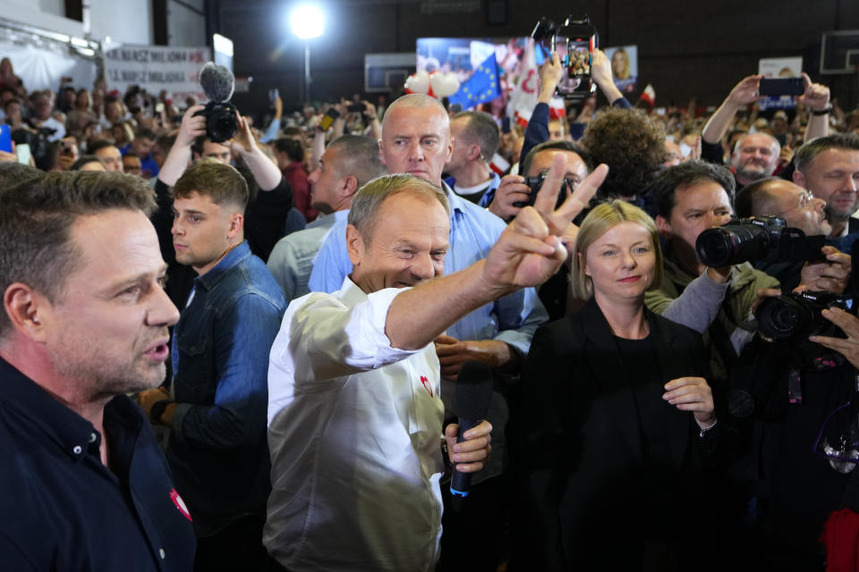 Poland's main opposition leader Donald Tusk arrives to address supporters during an election rally in Pruszkow, Poland, Friday, Oct. 13, 2023. Voters in Poland are heading into a divisive election Sunday, Oct. 15, 2023, that will chart the way forward for the European Union's fifth largest country by population size and its sixth biggest economy. Centrist coalition dominated by the Civic Platform party led by Donald Tusk, 66, a former Polish prime minister and former EU president, is the main opposition party. (AP Photo/Petr David Josek)