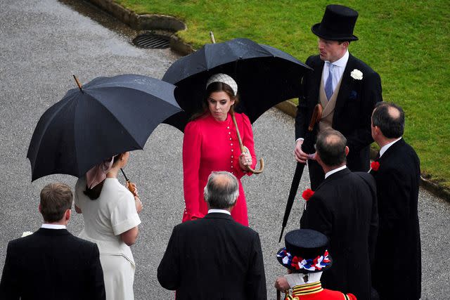 <p>CHRIS J RATCLIFFE/POOL/AFP via Getty</p> Princess Beatrice attends a Buckingham Palace garden party on May 21, 2024