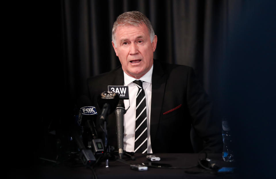 Geoff Walsh, pictured here addressing the media during a Collingwood Magpies press conference in 2019.