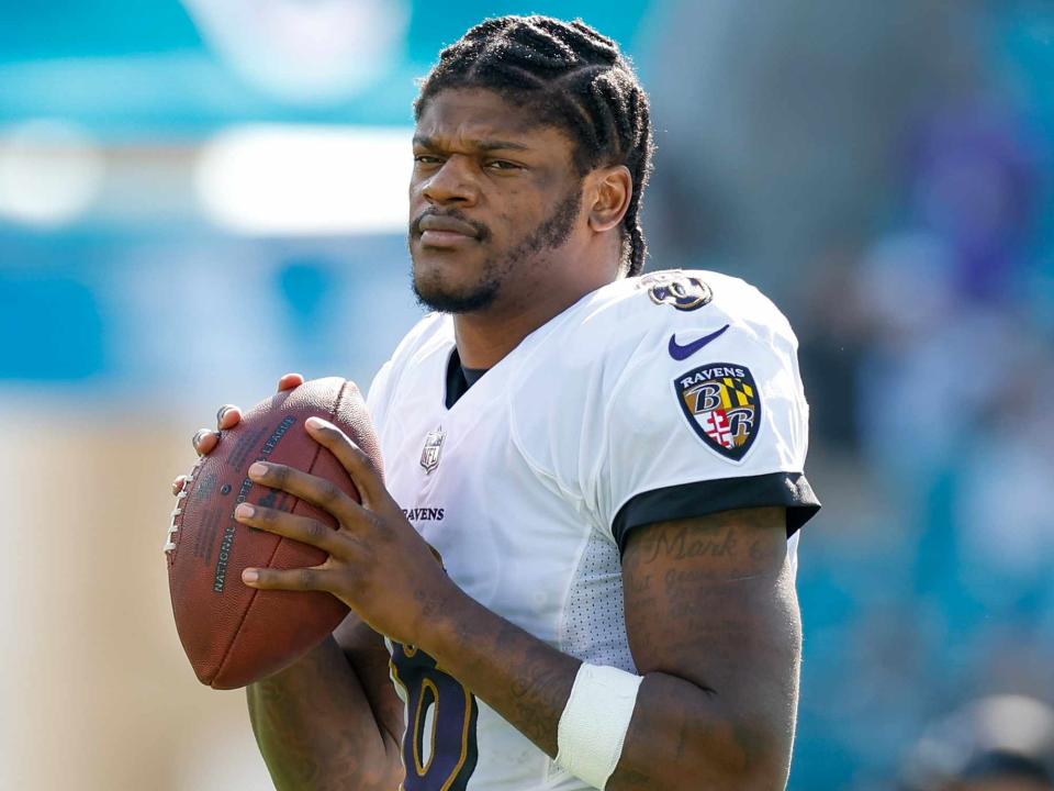 <p>David Rosenblum/Icon Sportswire/Getty </p> Lamar Jackson during the game between the Baltimore Ravens and the Jacksonville Jaguars on November 27, 2022 at TIAA Bank Field in Jacksonville, Fl.  