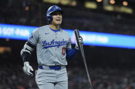 Los Angeles Dodgers' Shohei Ohtani reacts after striking out against the San Francisco Giants during the seventh inning of a baseball game Monday, May 13, 2024, in San Francisco. (AP Photo/Godofredo A. Vásquez)