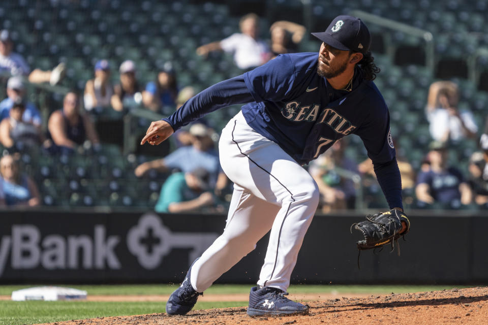 Seattle Mariners reliever Andres Munoz delivers a pitch during the eighth inning of a baseball game against the Cleveland Guardians, Thursday, Aug. 25, 2022, in Seattle. (AP Photo/Stephen Brashear)