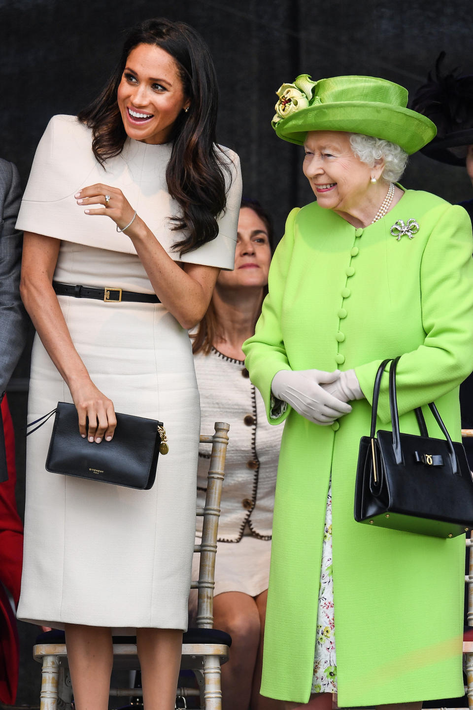 The queen stands with the Duchess of Sussex during a ceremony to open the new Mersey Gateway Bridge on June 14, 2018. (Photo: Jeff J Mitchell via Getty Images)