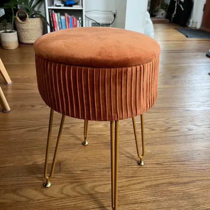 ribbed dark orange velvet ottoman with gold legs