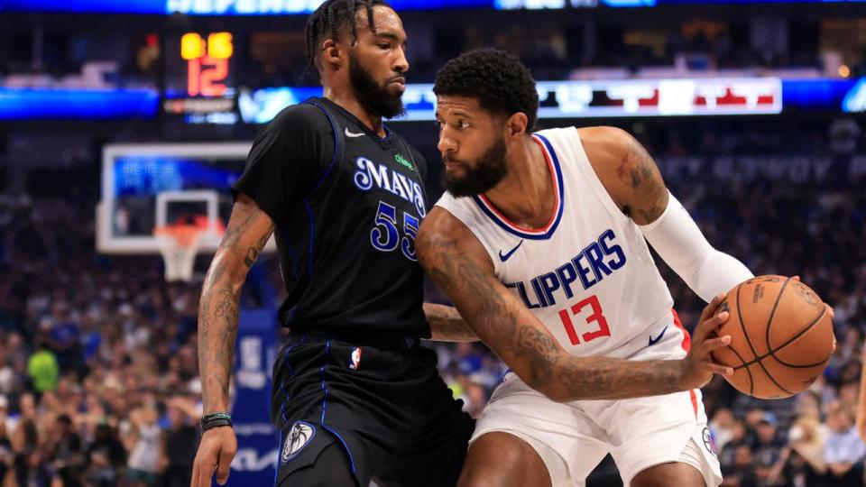 <div>Paul George #13 of the LA Clippers drives the ball against <a class="link " href="https://sports.yahoo.com/nba/players/5747/" data-i13n="sec:content-canvas;subsec:anchor_text;elm:context_link" data-ylk="slk:Derrick Jones Jr.;sec:content-canvas;subsec:anchor_text;elm:context_link;itc:0">Derrick Jones Jr.</a> #55 of the Dallas Mavericks. (Photo by Ron Jenkins/Getty Images)</div> <strong>(Getty Images)</strong>