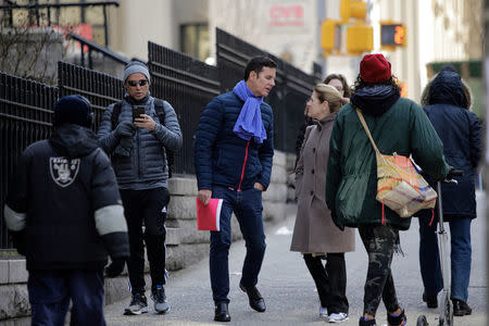 Chilean victim of clergy sexual abuse Juan Cruz (C) arrives to a meeting with investigator, Archbishop Charles Scicluna of Malta, in New York City, New York, U.S., February 17, 2018. REUTERS/Eduardo Munoz