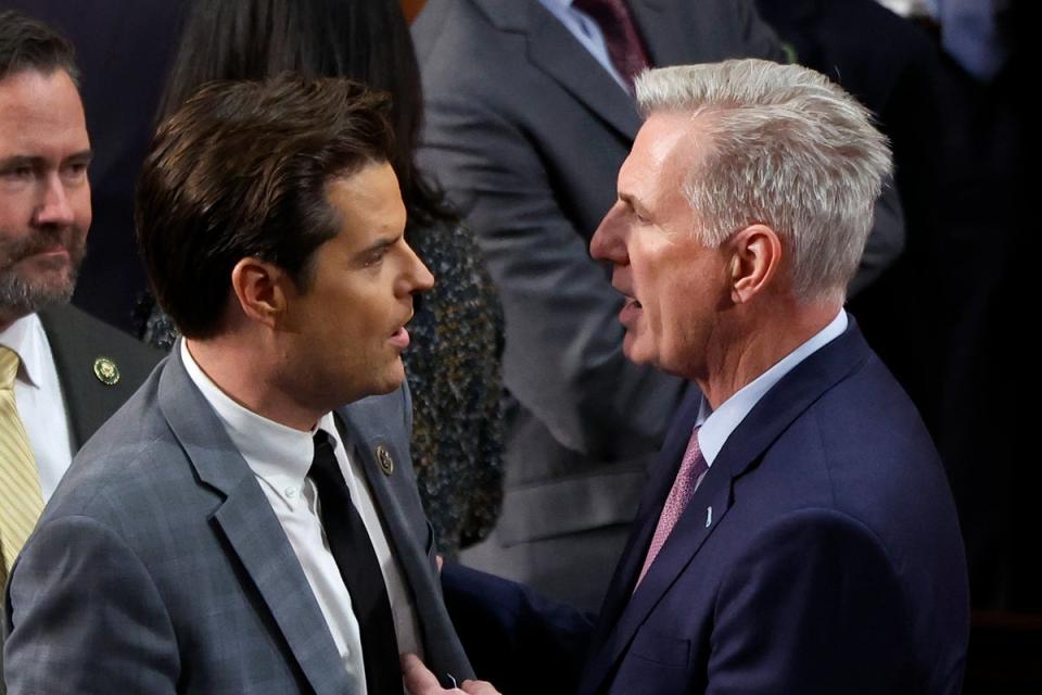 U.S. House Republican Leader Kevin McCarthy (R-CA) (L) talks to Rep.-elect Matt Gaetz (R-FL) in the House Chamber after Gaetz voted present during the fourth day of voting for Speaker of the House in January (Getty Images)