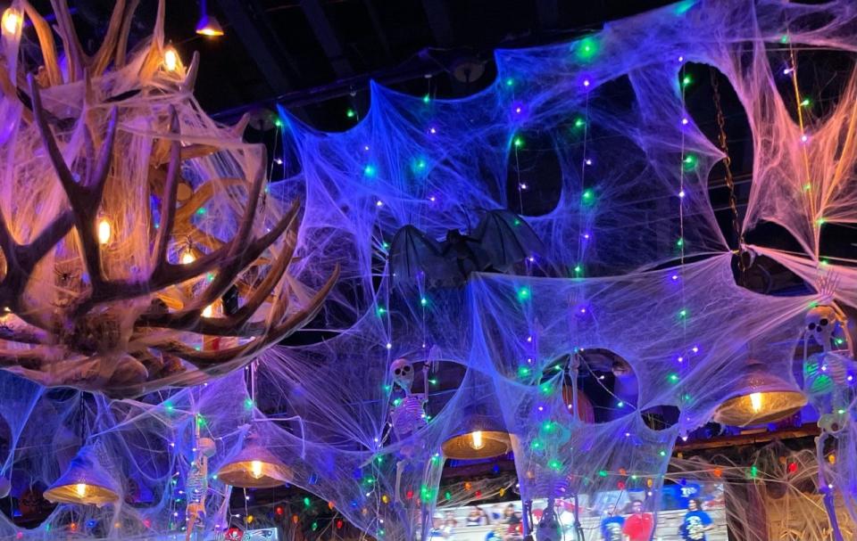 At Deer Camp's "Spooky Camp," chandeliers and more are covered in cobwebs.