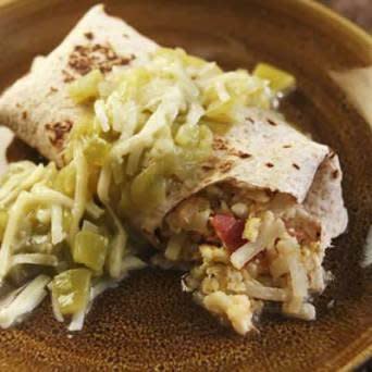 <strong>Get the <a href="http://www.huffingtonpost.com/2011/10/27/smothered-green-chile-bre_n_1062280.html" target="_blank">Smothered Green Chile Breakfast Burritos</a> recipe</strong>