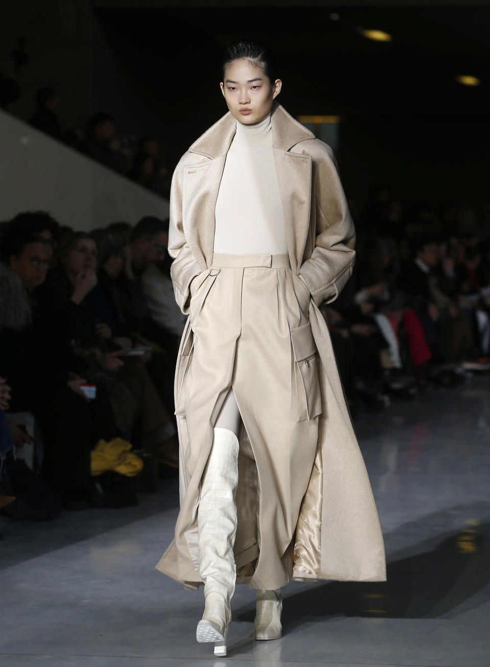 A model wears a creation as part of the Max Mara women's Fall-Winter 2019-20 collection, unveiled during the Fashion Week in Milan, Italy, Thursday, Feb. 21, 2019. (AP Photo/Antonio Calanni)