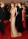 <p>Melania opted for a sequinned golden dress by Reem Acra for the 2011 Met Gala celebrating Alexander McQueen. Her accessories were by none other than McQueen. <i>[Photo: Getty]</i> </p>