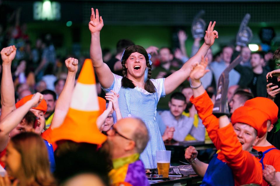 Fans enjoy the atmosphere in Cardiff’s Utilita Arena (PA)