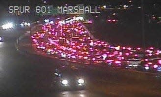 Traffic comes to a halt on the eastbound lanes of Spur 601 near Fort Bliss National Cemetery following a collision involving a pedestrian Thursday morning in Northeast El Paso.