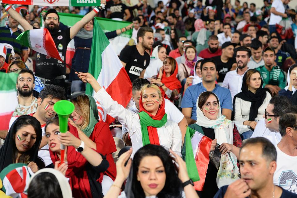Women are seen attending a public World Cup viewing event inside Tehran's Azadi Stadium on Wednesday. It was the first time in nearly 40 years that women were allowed inside. (Photo: Anadolu Agency via Getty Images)
