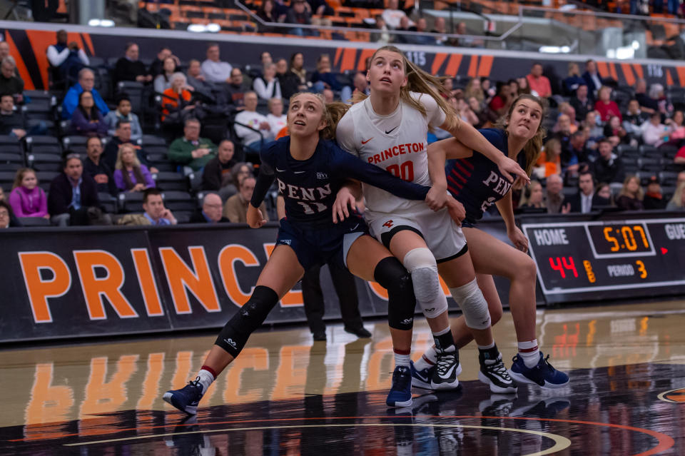 PRINCETON, NJ - FEBRUARY 25: Princeton Tigers forward Ellie Mitchell (00) fights for position with Pennsylvania Quakers guard Kendall Grasela (11) during the Ivy League college basketball game between the Penn Quakers and Princeton Tigers on February 25, 2020 at Jadwin Gymnasium in Princeton, NJ (Photo by John Jones/Icon Sportswire via Getty Images)