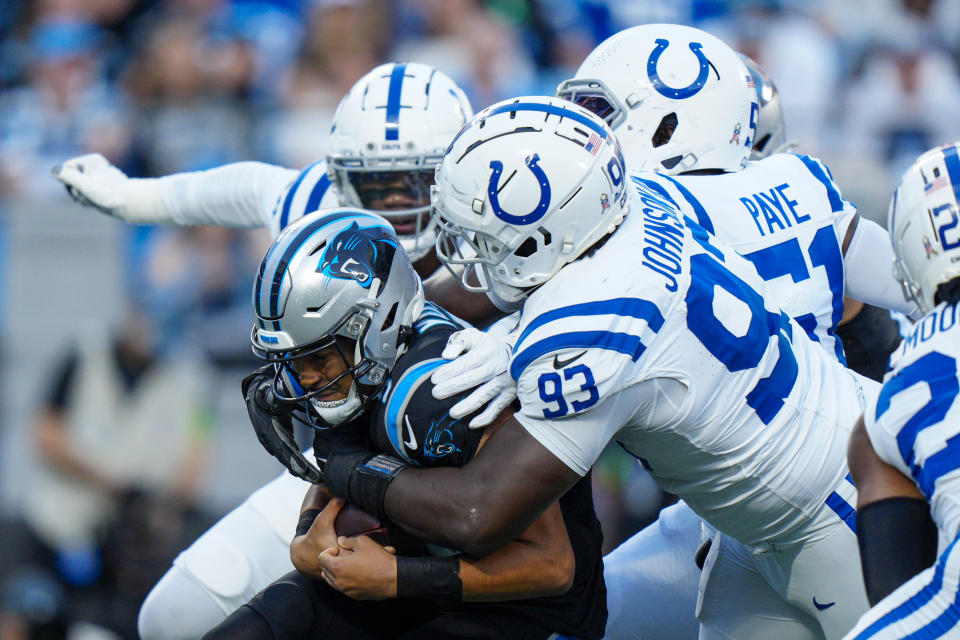 Carolina Panthers quarterback Bryce Young is sacked by Indianapolis Colts defensive tackle Eric Johnson II during the first half of an NFL football game Sunday, Nov. 5, 2023, in Charlotte, N.C. (AP Photo/Jacob Kupferman)