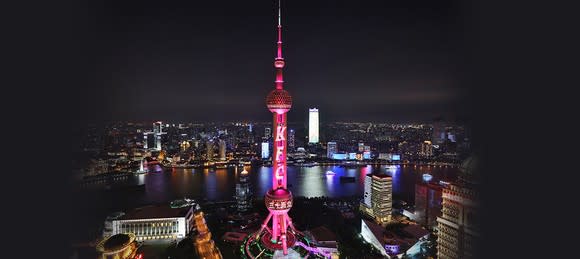 Shanghai's Pearl Tower lit up to celebrate the 30-year anniversary of KFC in China in July 2017.