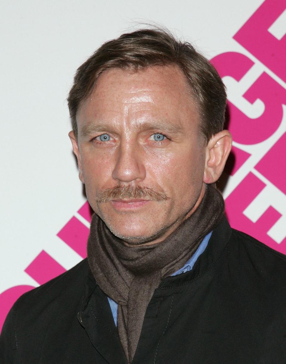 <p>Though he's known for portraying a perpetually clean-shaven James Bond in the 007 franchise, Daniel Craig has also proven that an impeccably trimmed blonde mustache is the perfect complement to his piercing blue eyes. </p>