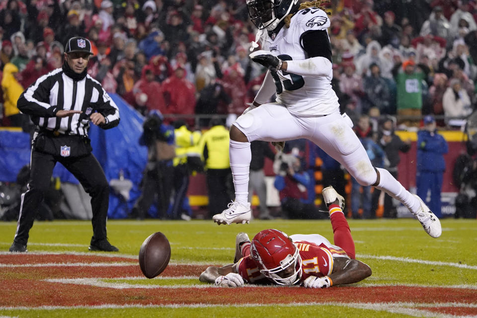 Kansas City Chiefs wide receiver Marquez Valdes-Scantling, bottom, is unable to catch a pass as Philadelphia Eagles cornerback Bradley Roby (33) defends during the fourth quarter of an NFL football game, Monday, Nov. 20, 2023, in Kansas City, Mo. (AP Photo/Ed Zurga)