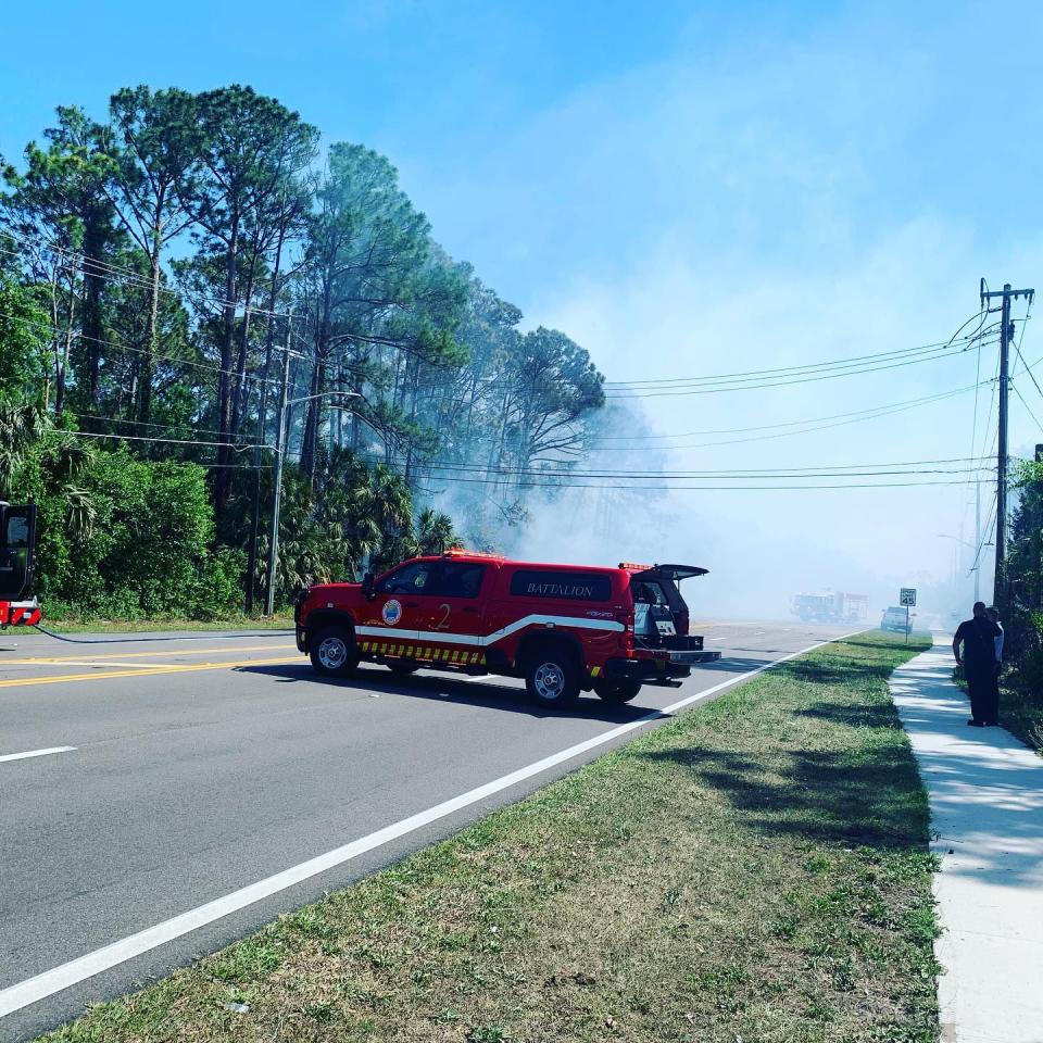 A brush fire caused the closure of a major Daytona Beach road Wednesday afternoon.