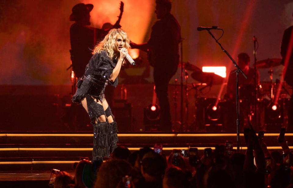 Superstar Carrie Underwood sings “Church Bells” to a packed Spectrum Center during her “Denim and Rhinestones” tour in Charlotte on Wednesday night. Underwood’s career was launched after she won the fourth season of “American Idol” in 2005