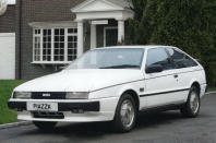 <p>How to make a rare sporting coupe even more of a hen’s tooth – fit it with an automatic gearbox. This is what has happened with the already thin on the ground Isuzu Piazza Turbo as there is but a single example of it left in base automatic transmission form (and another four on SORN).</p><p>Handsome styling by Giugiaro and a punchy 150bhp from its turbocharged 2.0-litre engine should have made the rear-drive Piazza a keen rival to the Ford Capri. However, the handling and ride were not up to much until Lotus was called in to sort things out, but by then it was too late and sales floundered.</p>