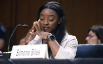 United States Olympic gymnast Simone Biles testifies during a Senate Judiciary hearing about the Inspector General's report on the FBI's handling of the Larry Nassar investigation on Capitol Hill, Wednesday, Sept. 15, 2021, in Washington. Nassar was charged in 2016 with federal child pornography offenses and sexual abuse charges in Michigan. He is now serving decades in prison after hundreds of girls and women said he sexually abused them under the guise of medical treatment when he worked for Michigan State and Indiana-based USA Gymnastics, which trains Olympians. (Saul Loeb/Pool via AP)