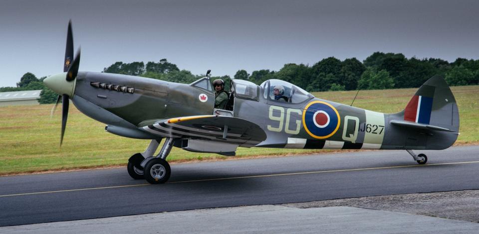 German Second World War pilot Hugo Broch (right) making his maiden voyage in a Spitfire at Biggin Hill - Credit: Neil Genower/historyhit.tv/PA