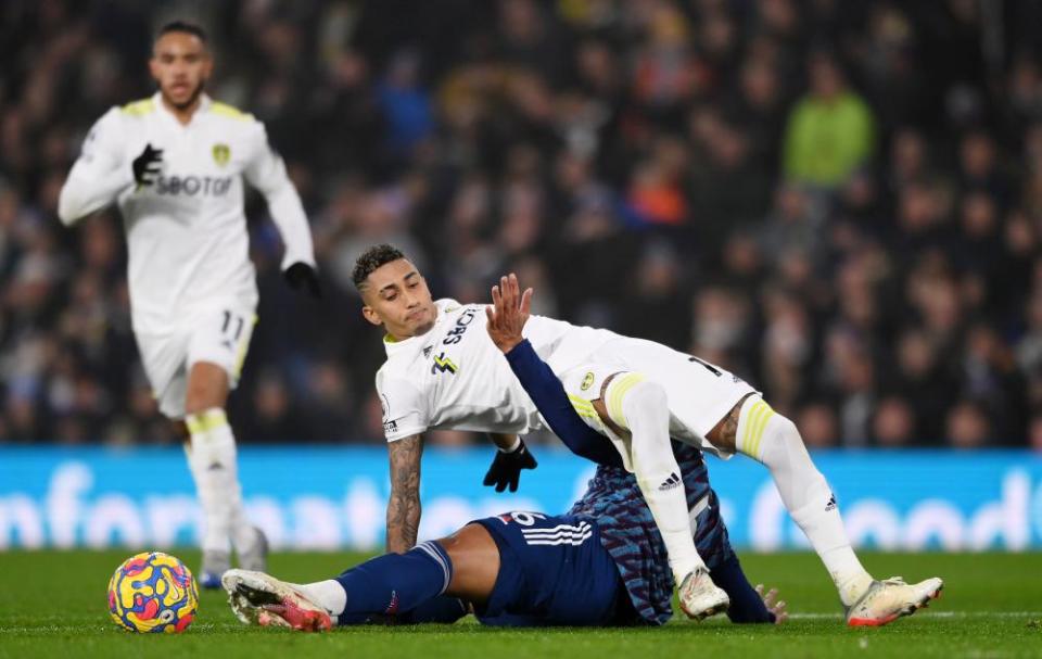 Raphinha of Leeds United is challenged by Gabriel of Arsenal at Elland Road. The visitors won 4-1.