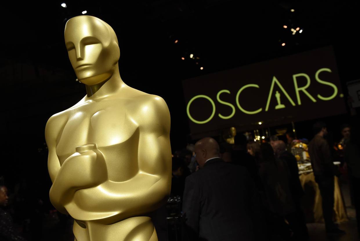 FILE - In this Friday, Feb. 15, 2019, file photo, an Oscar statue is pictured at the press preview for the 91st Academy Awards Governors Ball in Los Angeles. Movies that debuted on a streaming service without a theatrical run will be eligible for the Oscars, but only this year. The Academy of Motion Pictures Arts and Sciences on Tuesday announced the change for the 93rd Academy Awards as a response to how the coronavirus pandemic has impacted the film industry. (Photo by Chris Pizzello/Invision/AP, File)