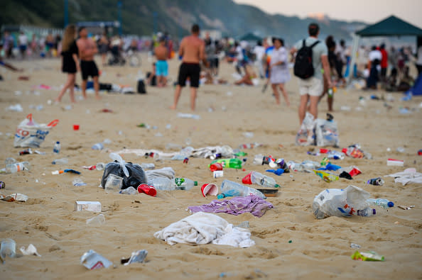 Rubbish litters the beach after many visitors spent the day there in Bournemouth, United Kingdom. 