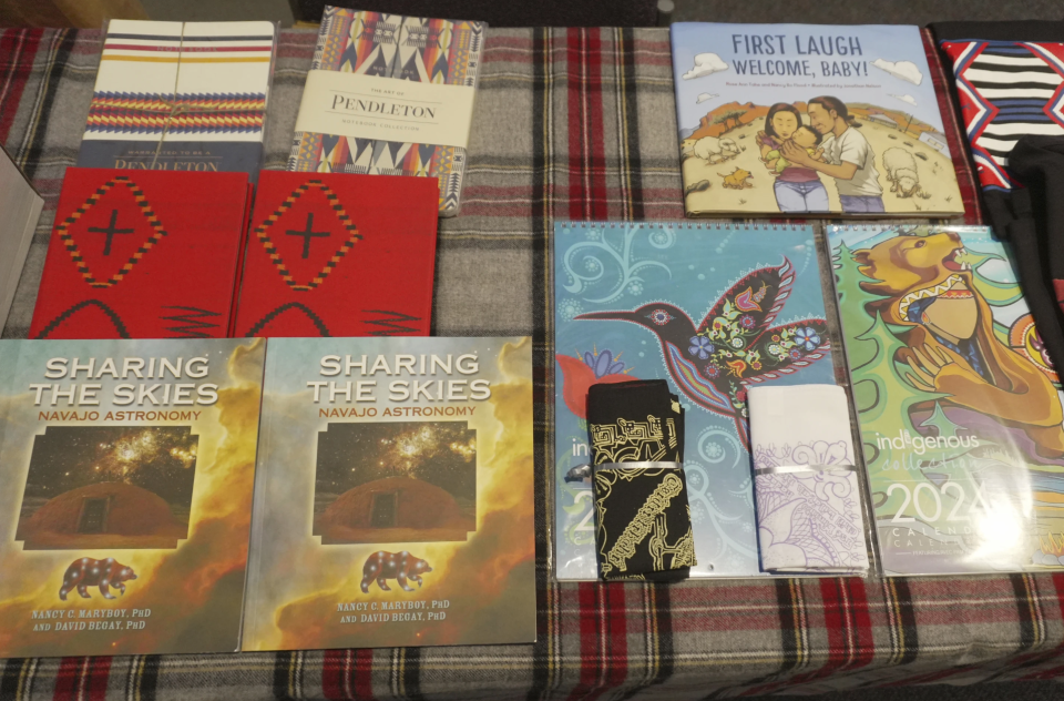 Books on Navajo culture are displayed, Saturday, Oct. 7, 2023, in Gallup, N.M., during a learning session on how to observe Navajo new year and the annular "ring of fire" solar eclipse. The prime viewing path for the eclipse Saturday will cut diagonally across the Western U.S., including the Navajo Nation, the largest land base of any Native American tribe in Arizona, New Mexico and Utah.