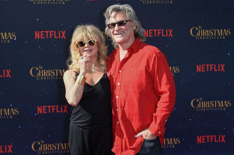 Goldie Hawn, left, and Kurt Russell attend the world premiere of "The Christmas Chronicles" at the Regency Bruin Theatre on Sunday, Nov. 18, 2018, in Los Angeles.