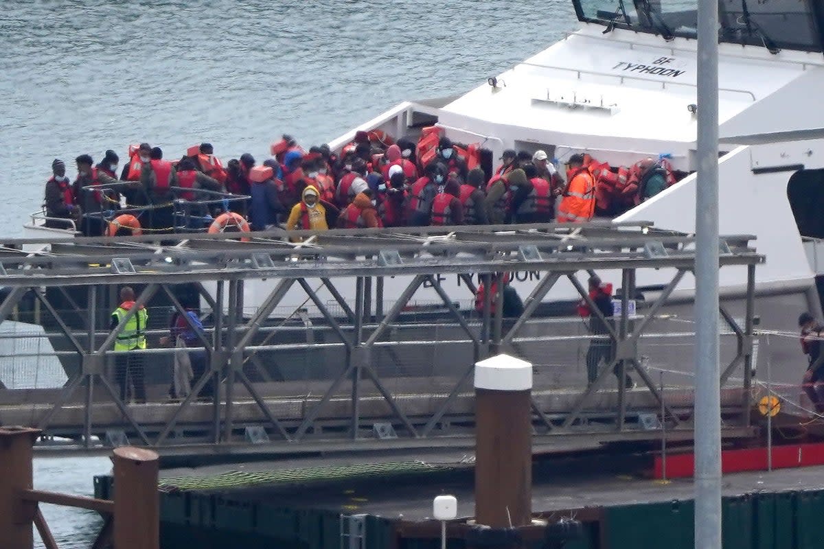 Migrants rescued from small boats in the English Channel are brought to Dover (PA)