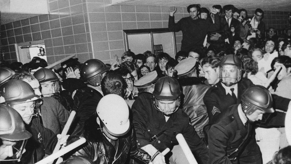 Police use tear gas and night sticks to break up anti-war demonstrations at the University of Wisconsin campus in Madison, Oct. 18, 1967. - Neal Ulevich/AP